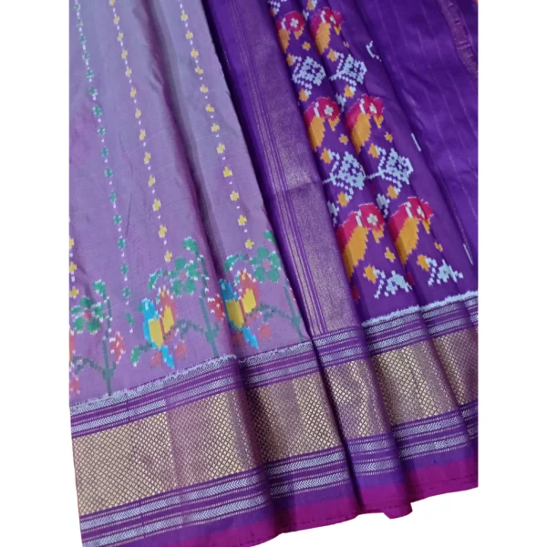 Lavendar and purple colour double ikkat silk saree with beautiful parrot design