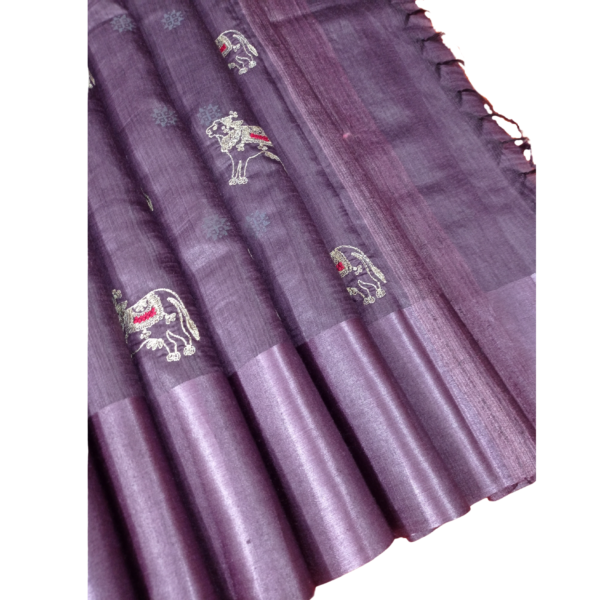 Purple colour tussar silk saree with beautiful cow design
