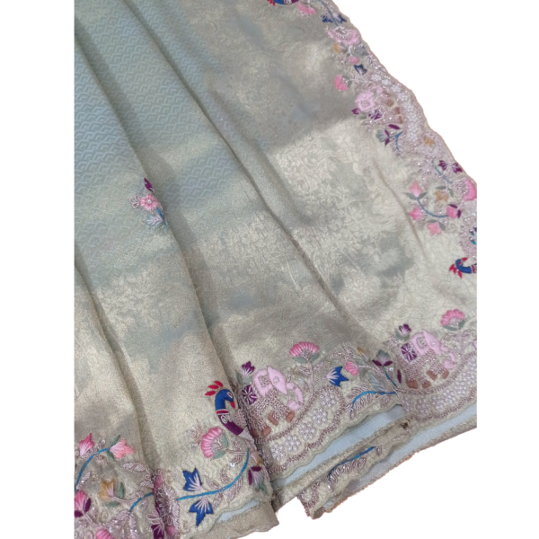 Hues of green colour saree with beautiful embroidery design