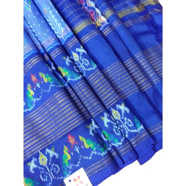 Blue colour double ikkat silk saree with beautiful parrot design