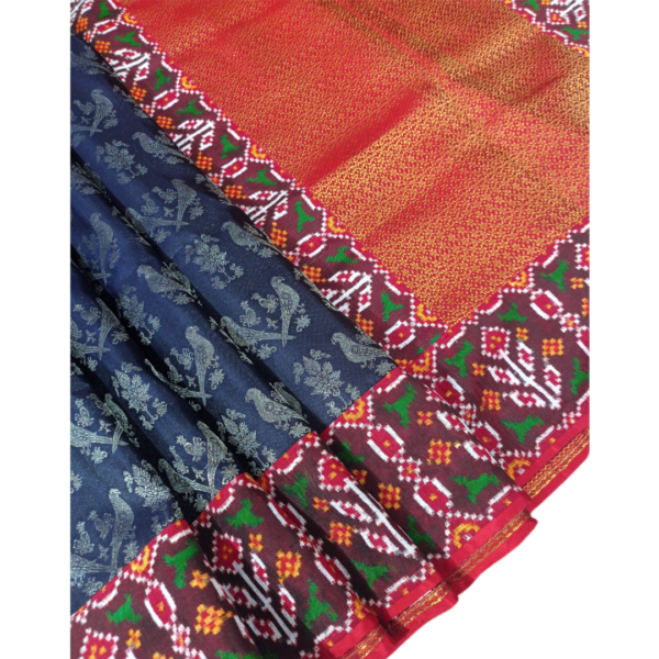 Dark navy blue and redcolour twill patola saree with beautiful bird design
