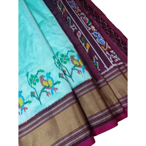 Blue and coffee brown colour pochampally double ikkat silk saree with beautiful peacock and parrot design