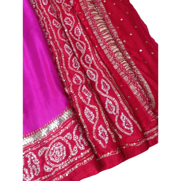 Pink and red bandhini saree
