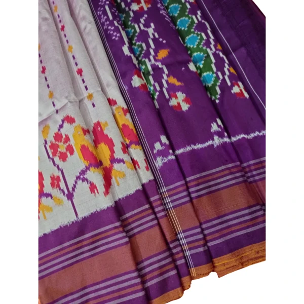 Purple and light  pink colour pochampally double ikkat silk saree with beautiful peacock design
